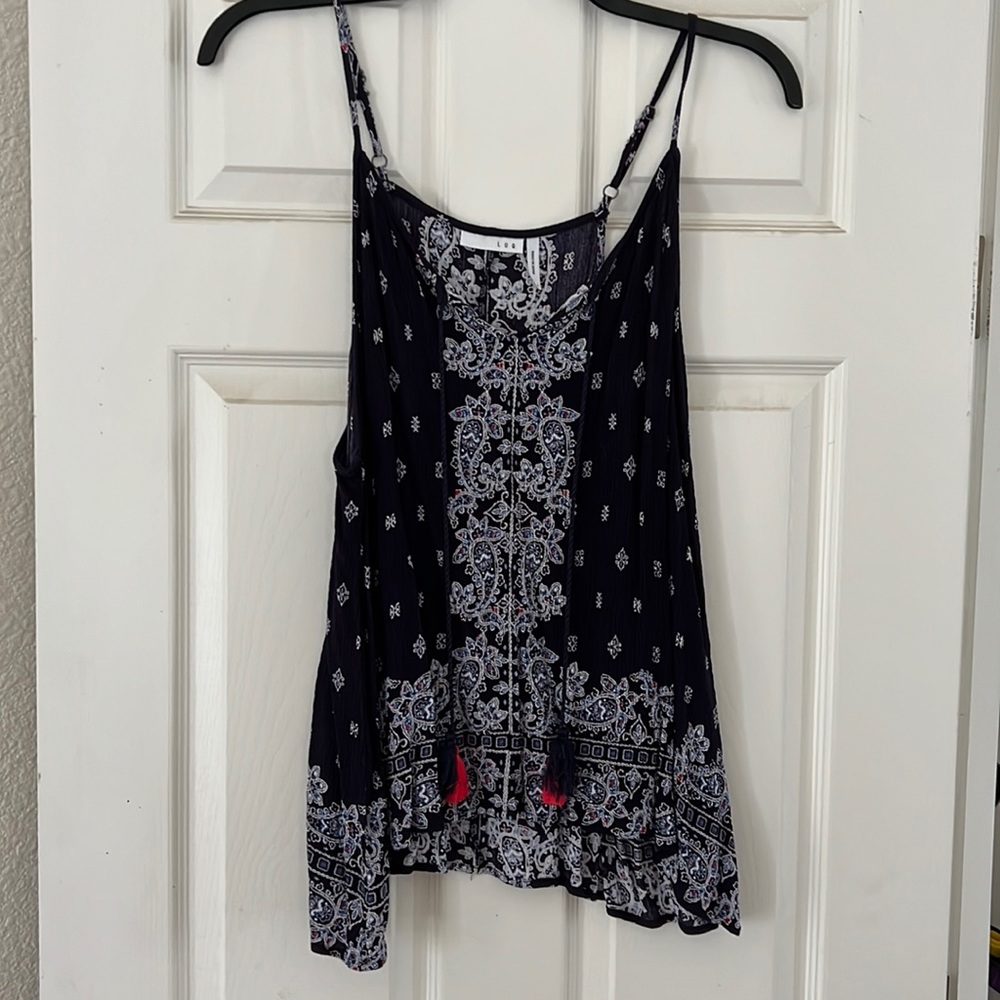 LOQ brand cami style shirt size says xxl but really large cute with white shorts